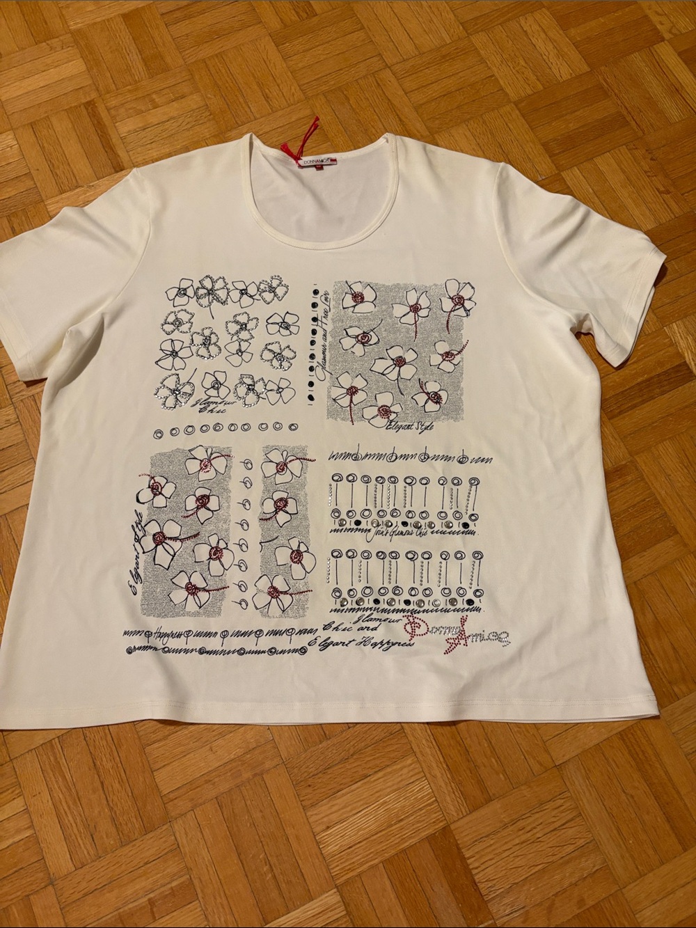 Donn Amica Women's White Floral Graphic  top. NWOT